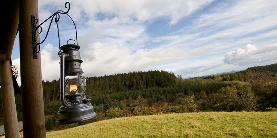 View of field from safari tent, with lantern