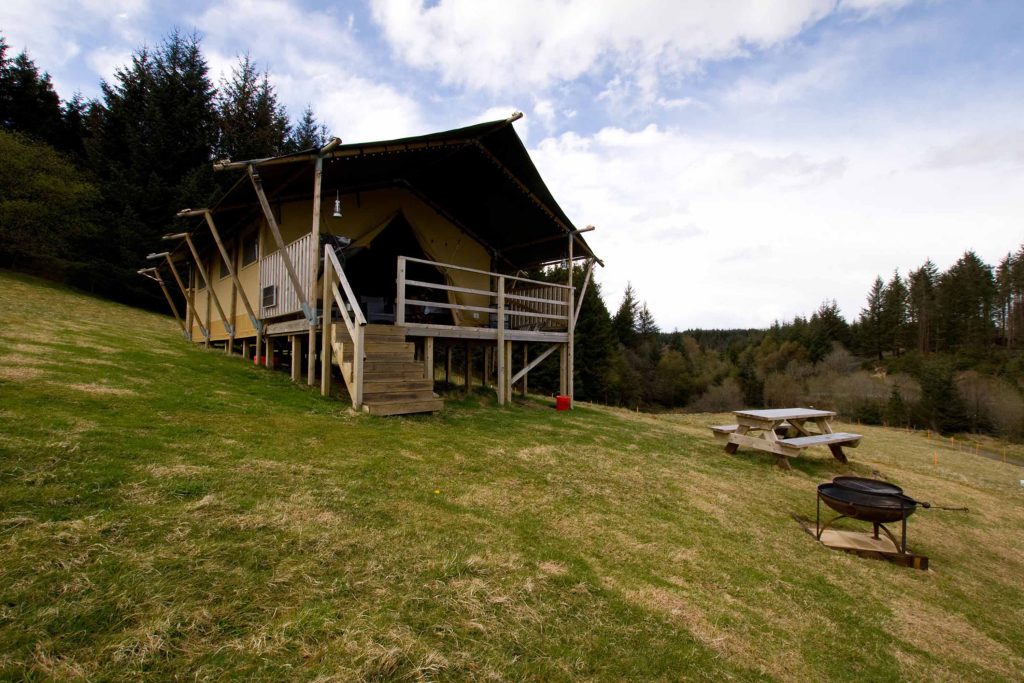 view of safari tent and steps